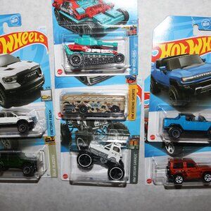 Hot Wheels lot of 7 trucks, tank and bus variety all NIP